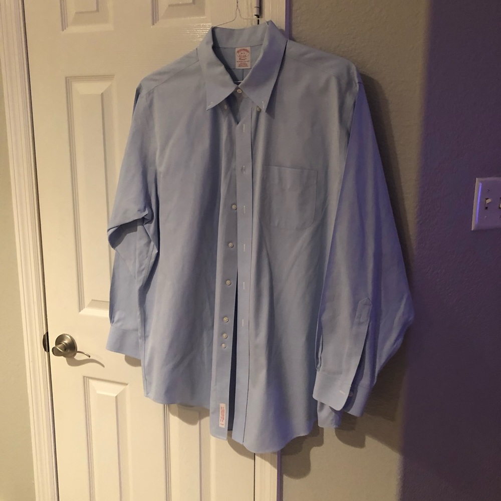 Brooks Brothers classic light blue business shirt; Neck is 18”, sleeve is 35”.